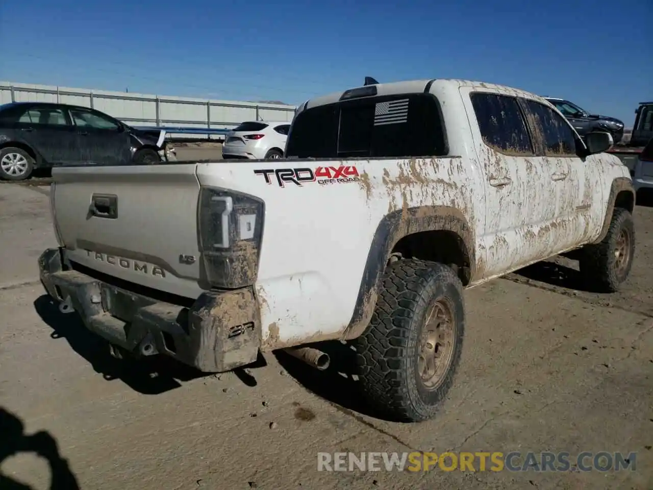 4 Photograph of a damaged car 5TFCZ5AN0KX169763 TOYOTA TACOMA 2019