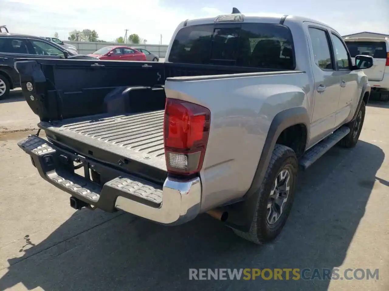 4 Photograph of a damaged car 5TFCZ5AN0KX175479 TOYOTA TACOMA 2019