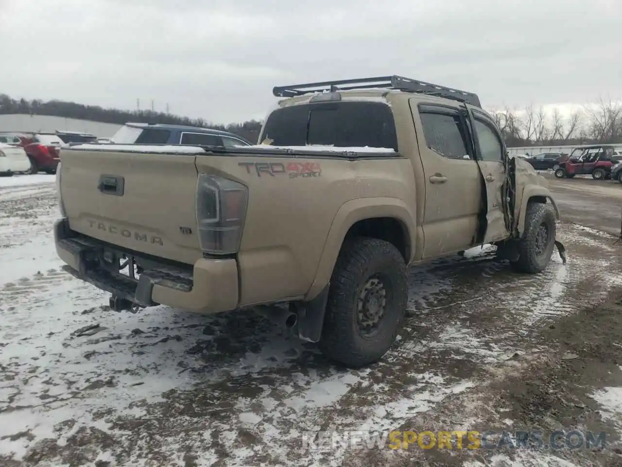 4 Photograph of a damaged car 5TFCZ5AN0KX183713 TOYOTA TACOMA 2019