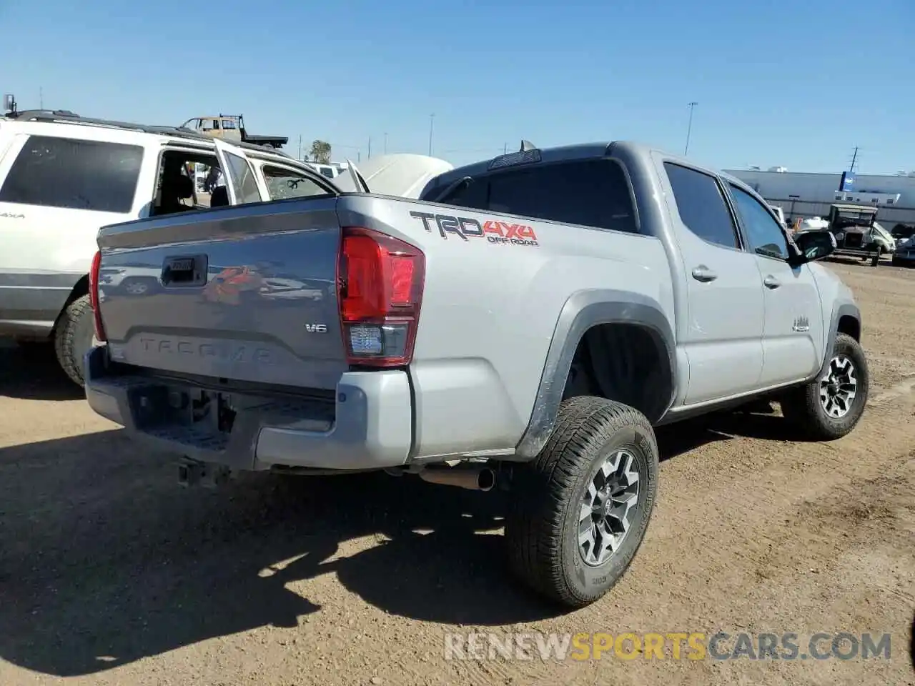 4 Photograph of a damaged car 5TFCZ5AN0KX188264 TOYOTA TACOMA 2019