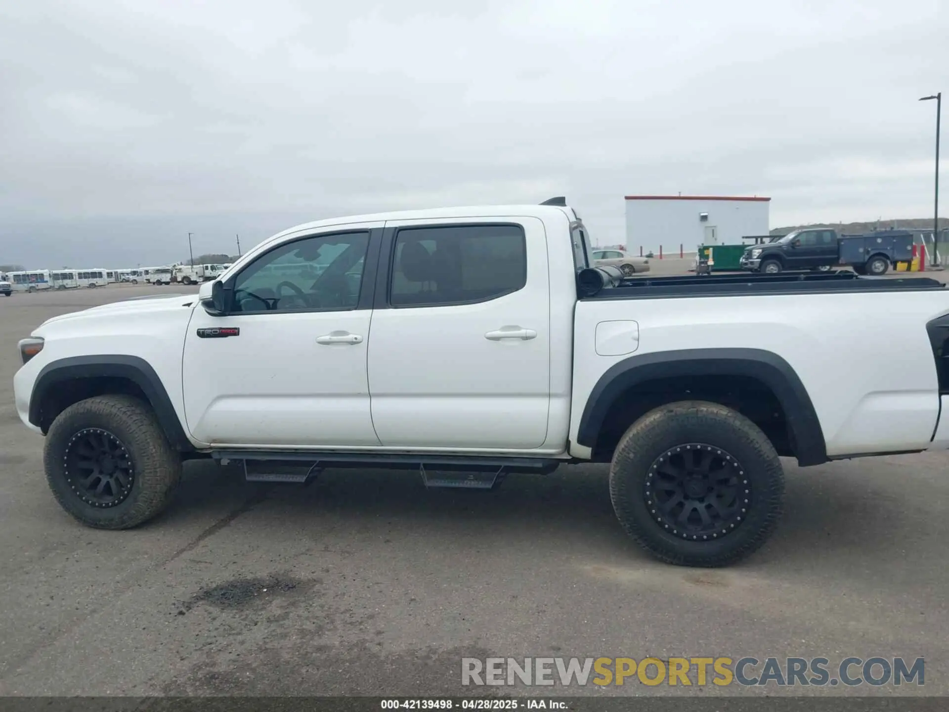 14 Photograph of a damaged car 5TFCZ5AN0KX190354 TOYOTA TACOMA 2019