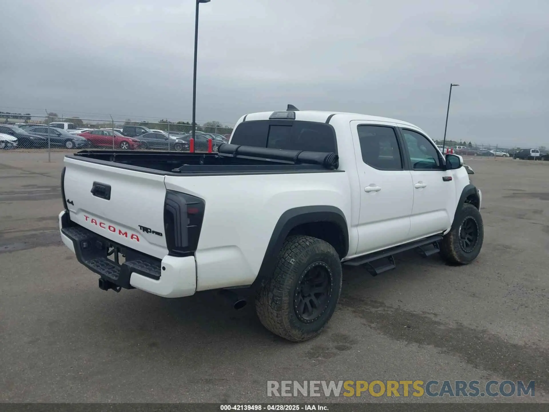 4 Photograph of a damaged car 5TFCZ5AN0KX190354 TOYOTA TACOMA 2019