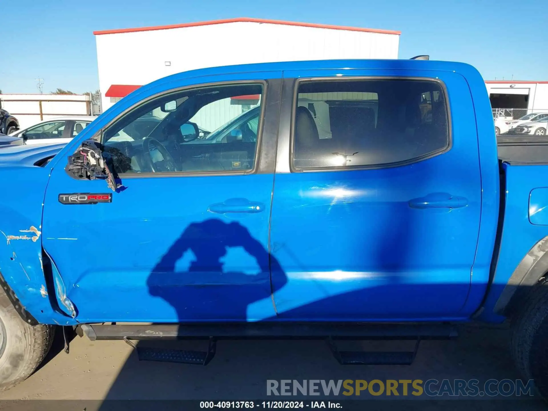 14 Photograph of a damaged car 5TFCZ5AN0KX199524 TOYOTA TACOMA 2019
