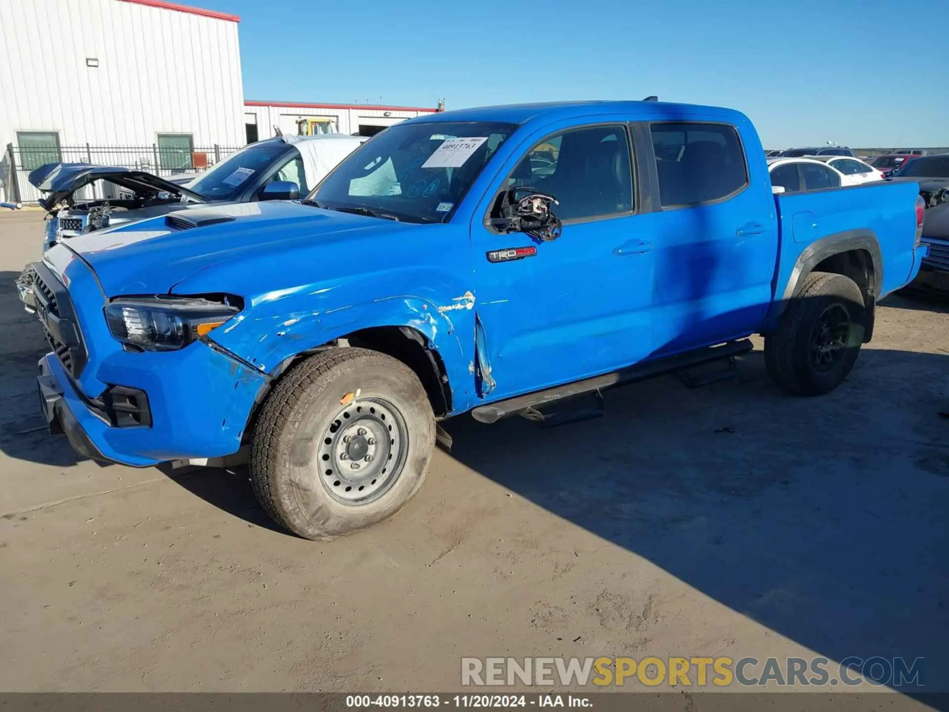 2 Photograph of a damaged car 5TFCZ5AN0KX199524 TOYOTA TACOMA 2019