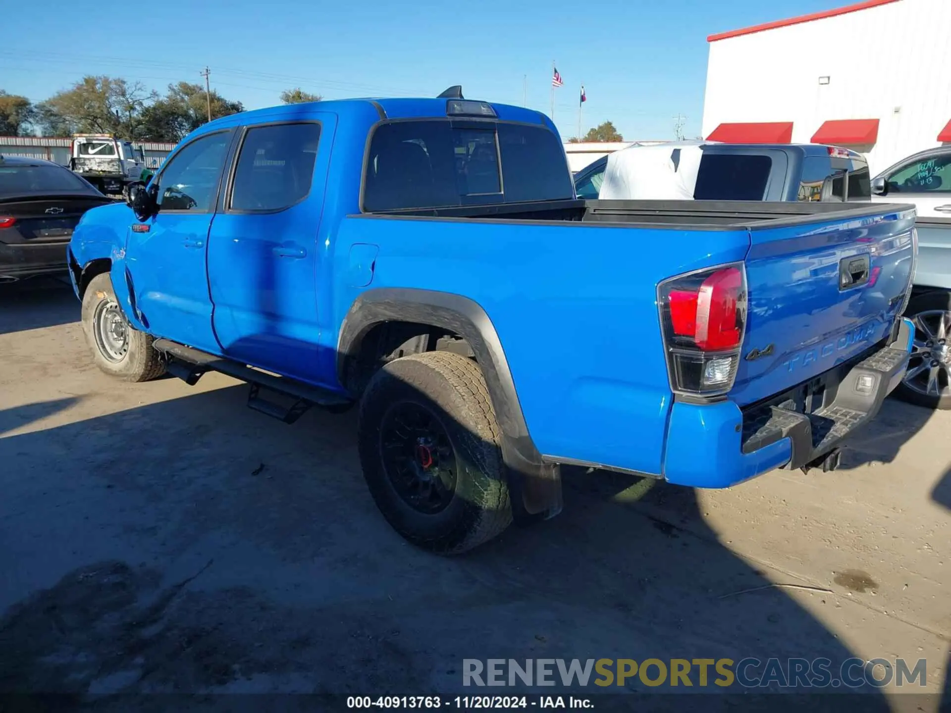 3 Photograph of a damaged car 5TFCZ5AN0KX199524 TOYOTA TACOMA 2019