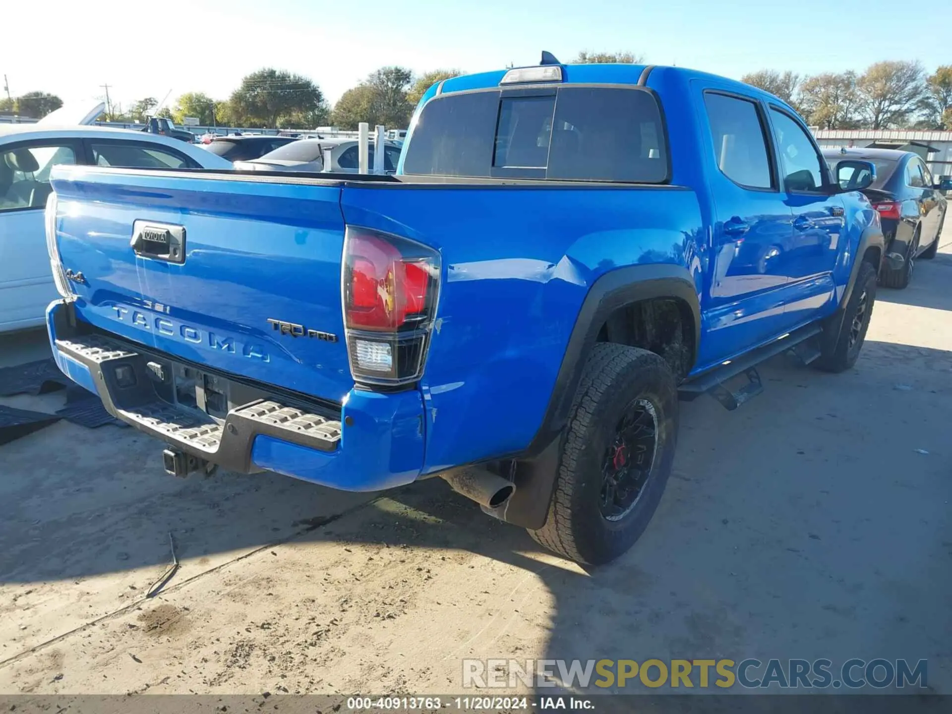4 Photograph of a damaged car 5TFCZ5AN0KX199524 TOYOTA TACOMA 2019