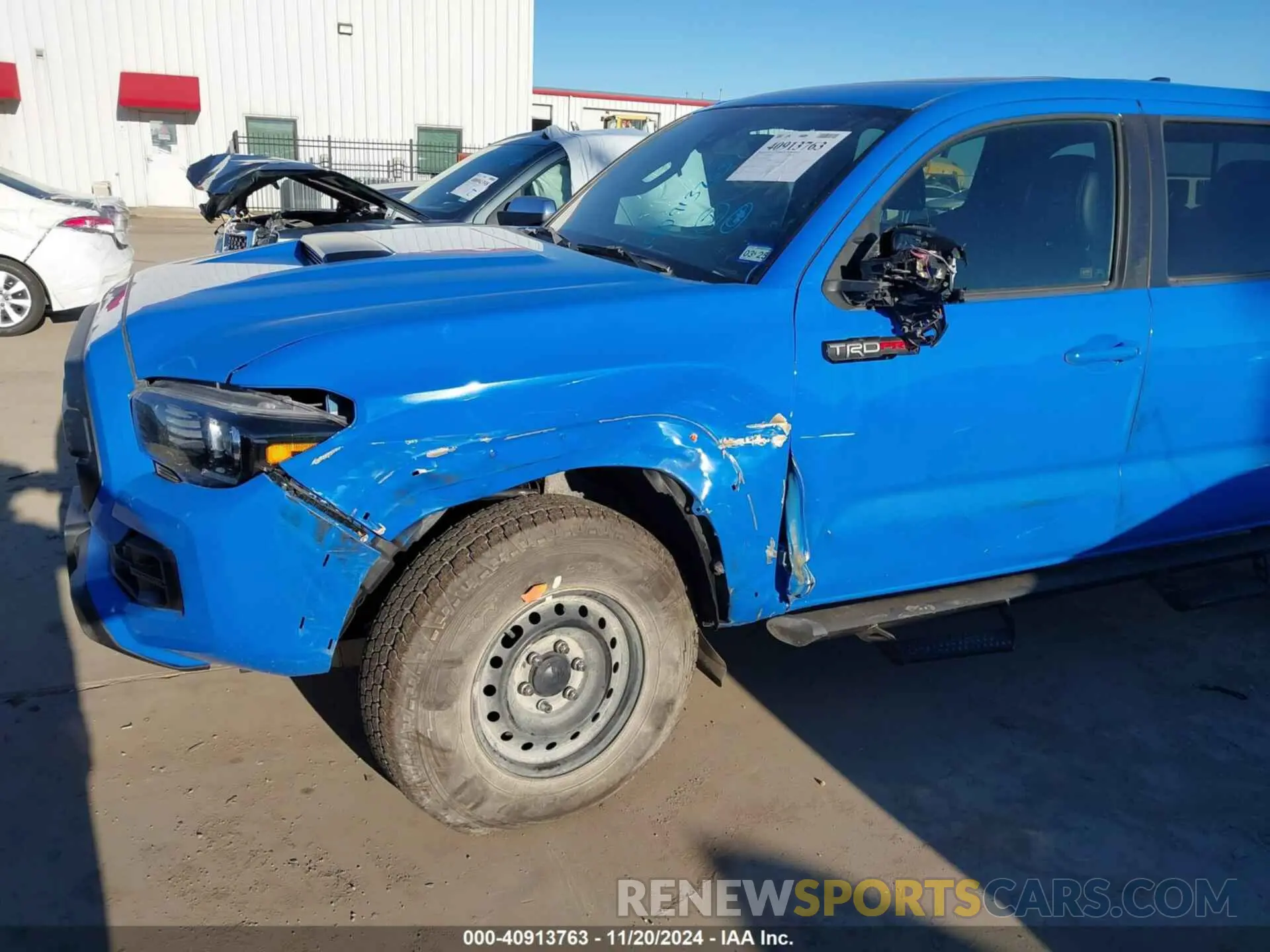 6 Photograph of a damaged car 5TFCZ5AN0KX199524 TOYOTA TACOMA 2019