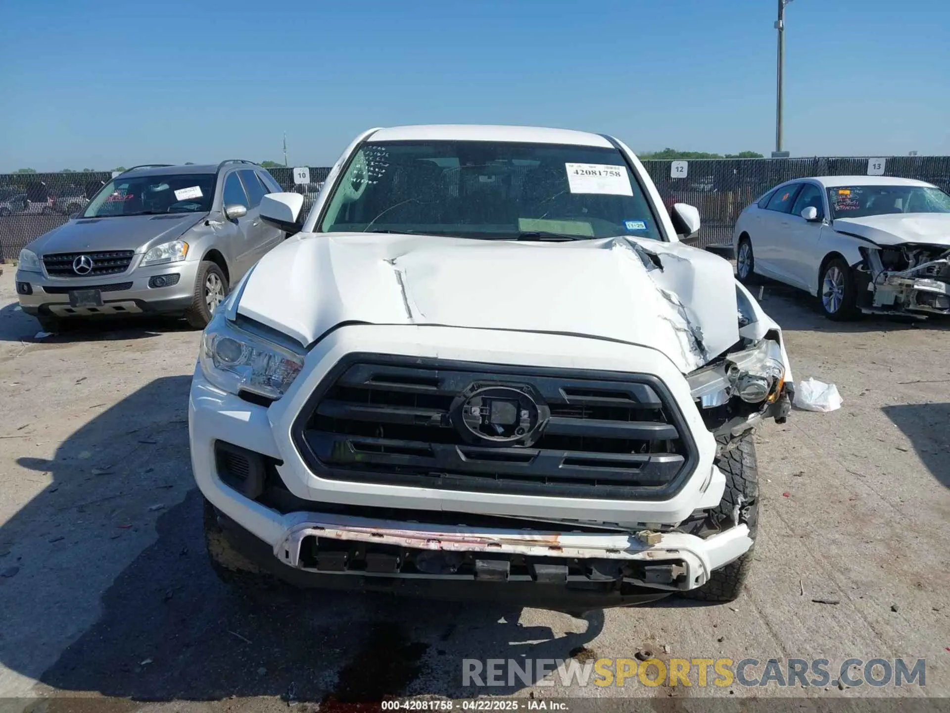 12 Photograph of a damaged car 5TFCZ5AN1KX170453 TOYOTA TACOMA 2019