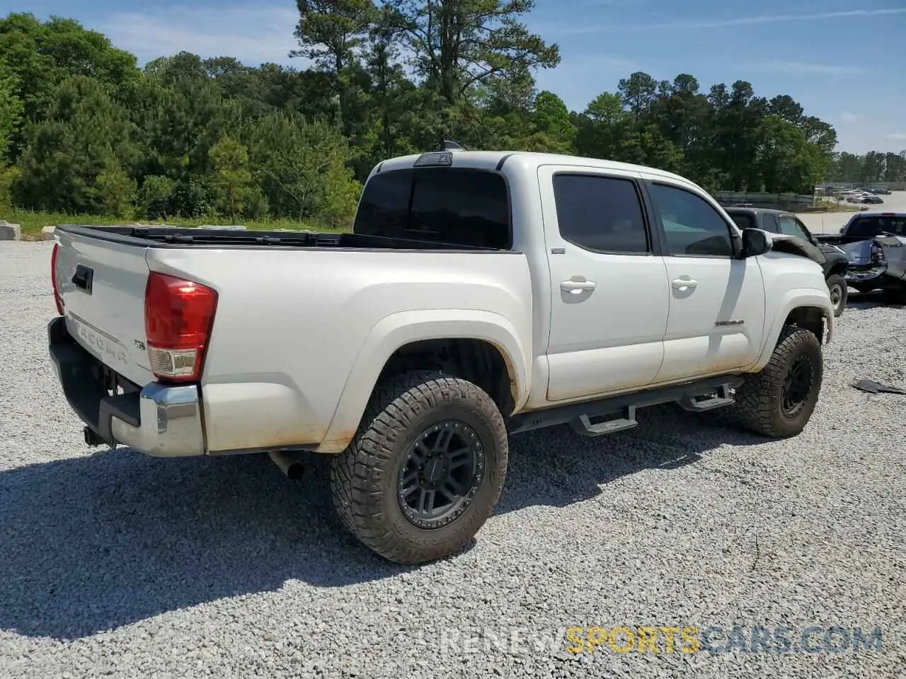 3 Photograph of a damaged car 5TFCZ5AN1KX174454 TOYOTA TACOMA 2019