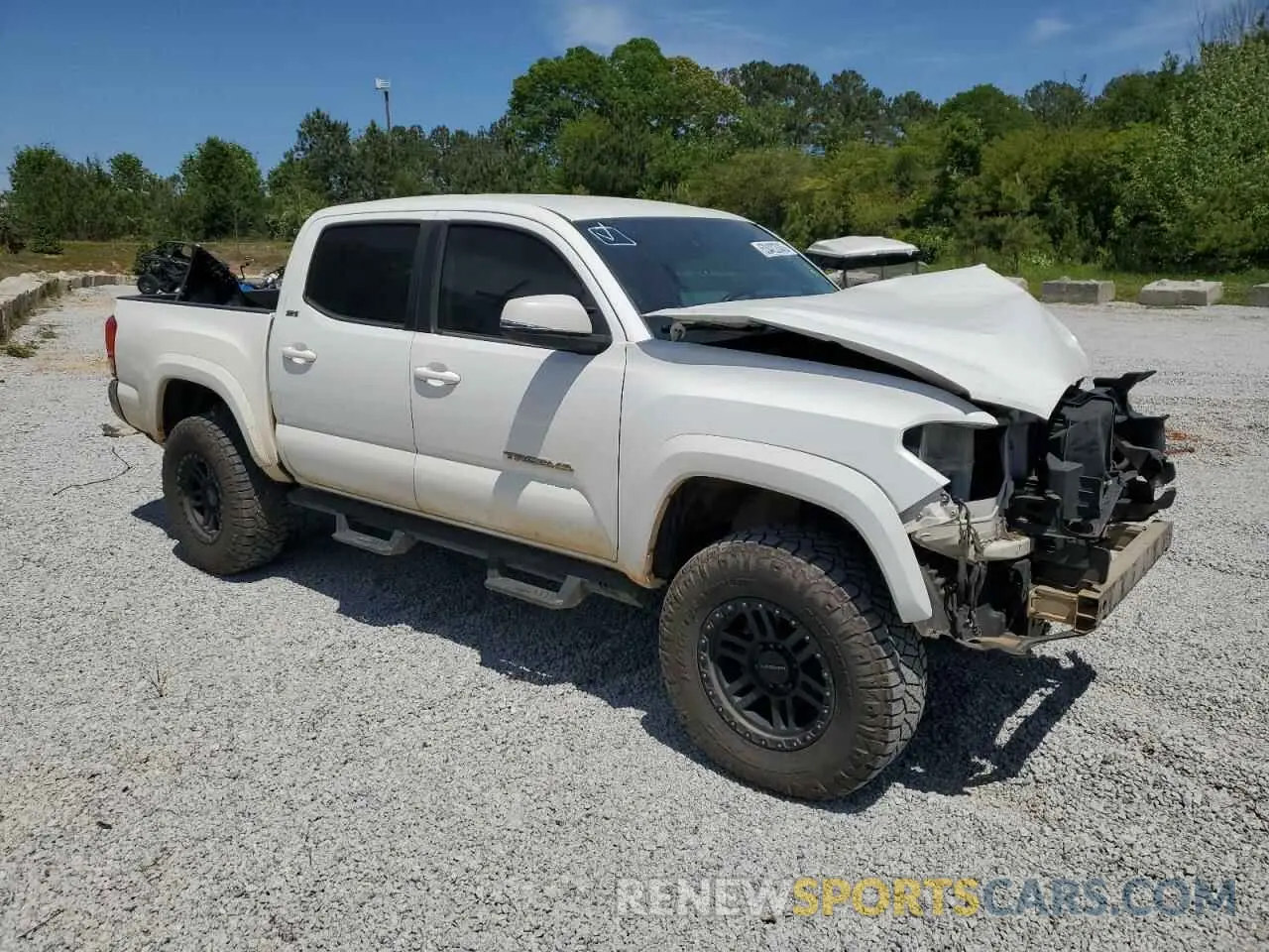 4 Photograph of a damaged car 5TFCZ5AN1KX174454 TOYOTA TACOMA 2019