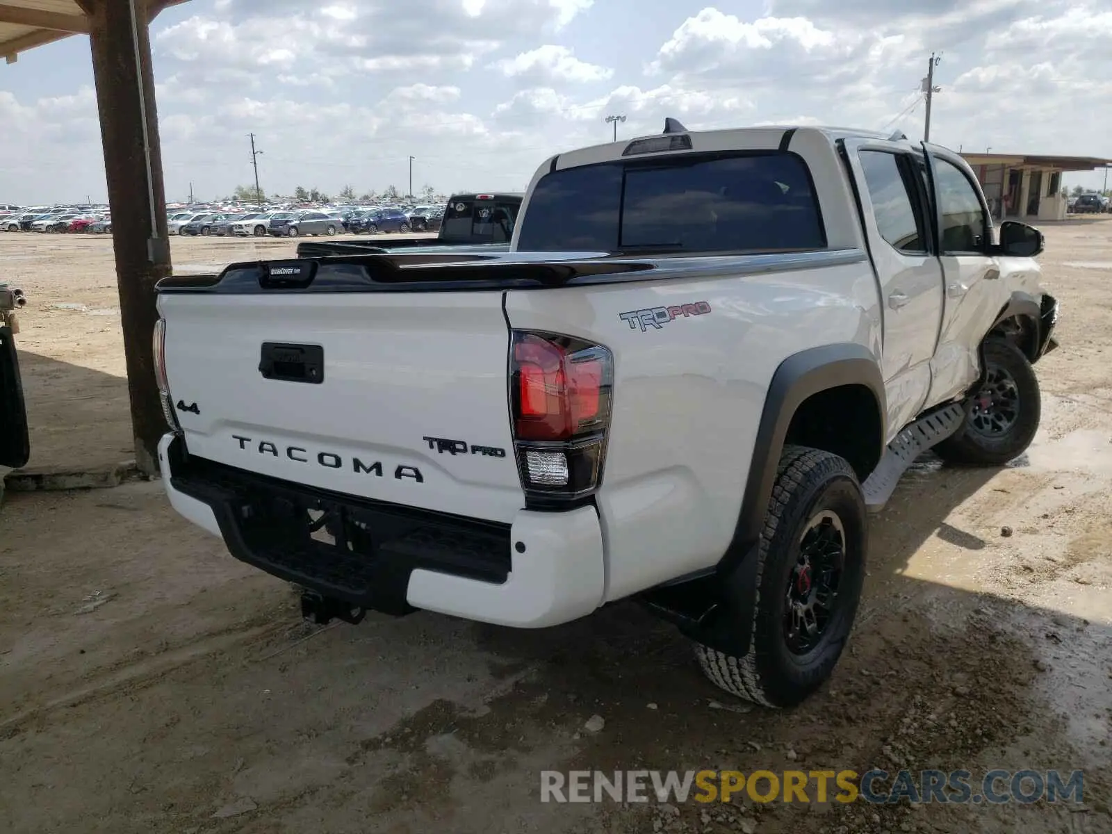 4 Photograph of a damaged car 5TFCZ5AN1KX189049 TOYOTA TACOMA 2019