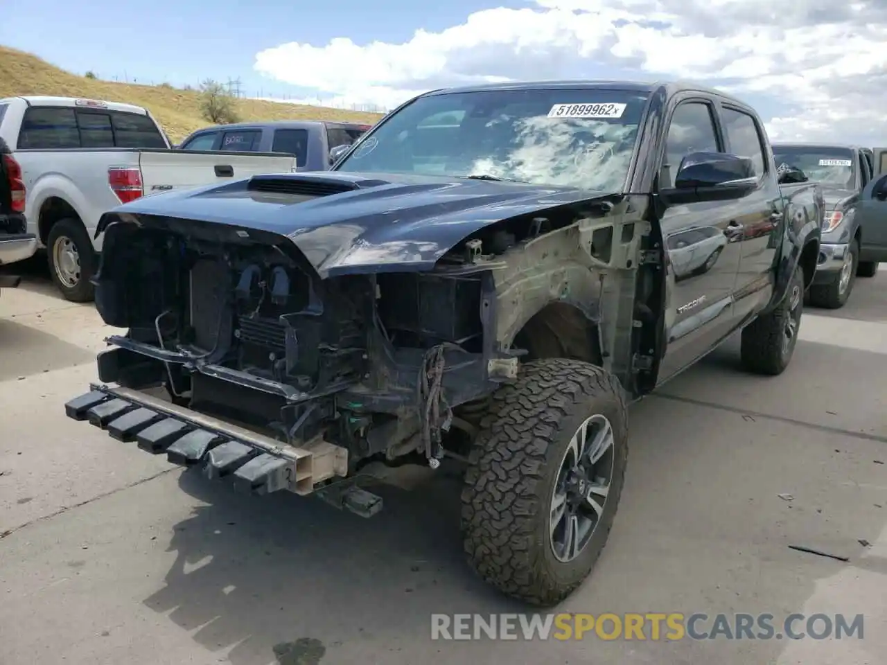 2 Photograph of a damaged car 5TFCZ5AN1KX189973 TOYOTA TACOMA 2019