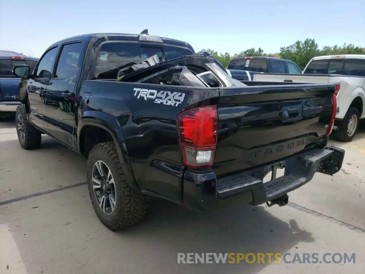 3 Photograph of a damaged car 5TFCZ5AN1KX189973 TOYOTA TACOMA 2019