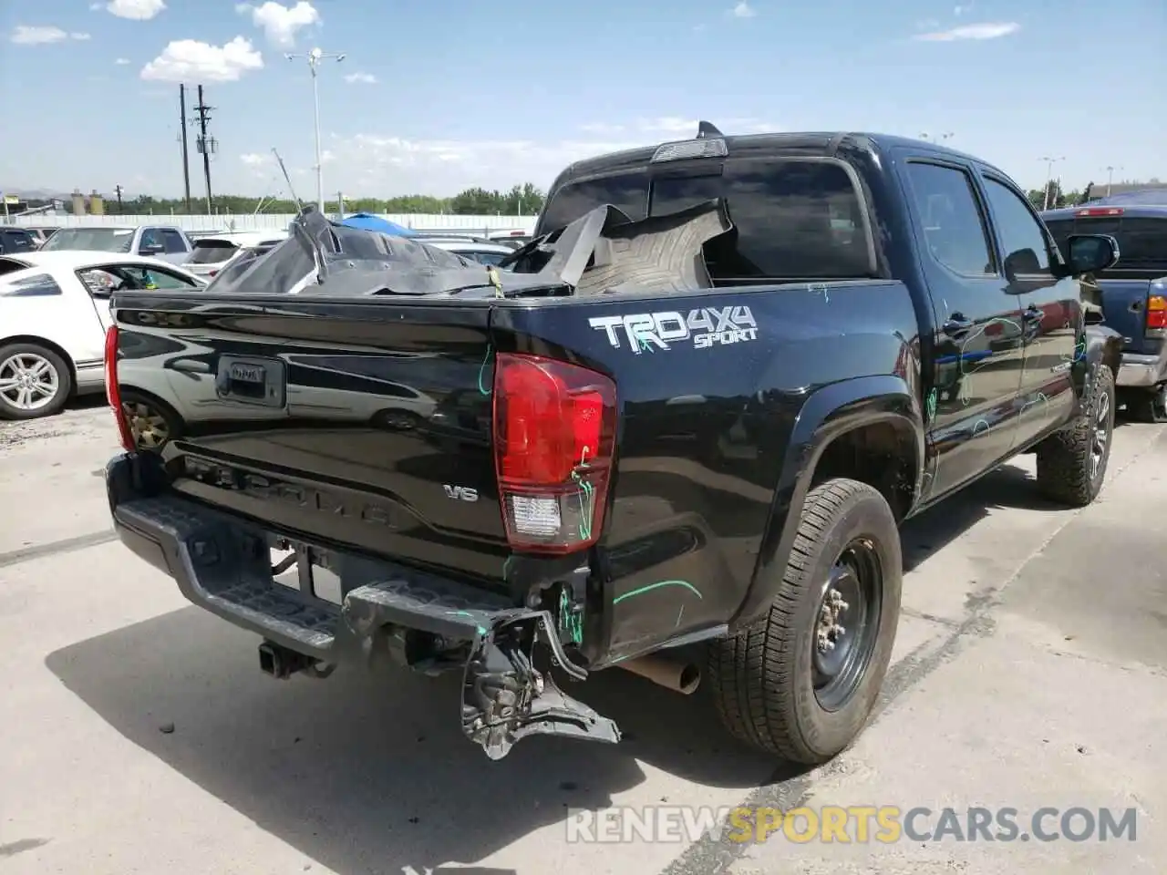 4 Photograph of a damaged car 5TFCZ5AN1KX189973 TOYOTA TACOMA 2019