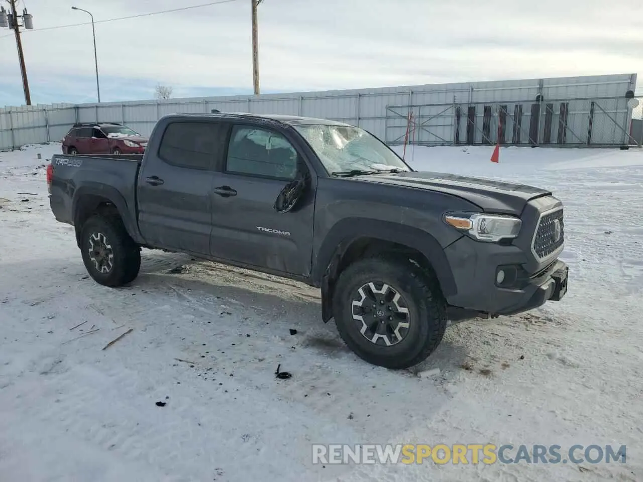 4 Photograph of a damaged car 5TFCZ5AN1KX193232 TOYOTA TACOMA 2019