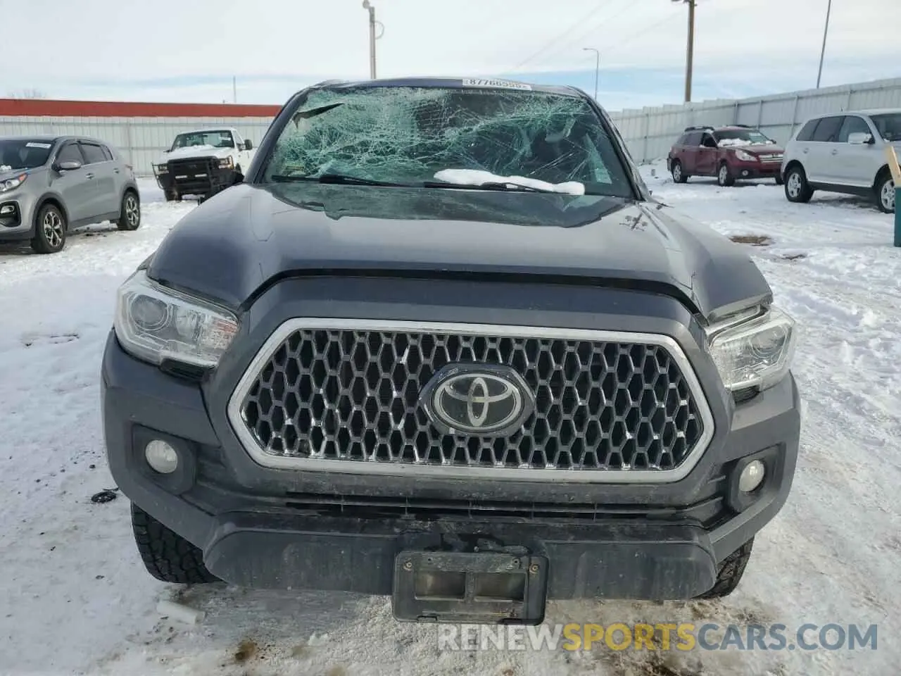 5 Photograph of a damaged car 5TFCZ5AN1KX193232 TOYOTA TACOMA 2019