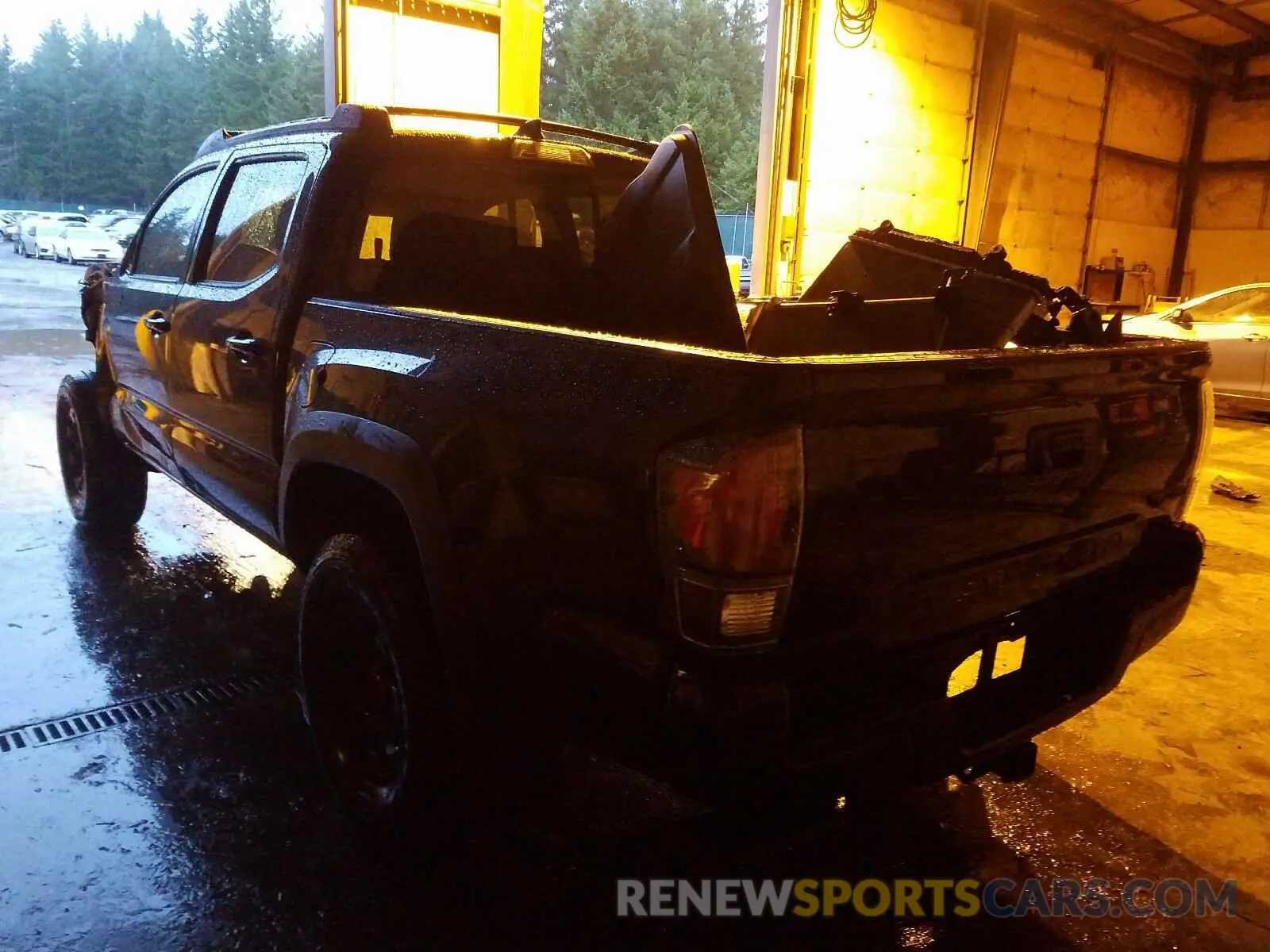 3 Photograph of a damaged car 5TFCZ5AN1KX194462 TOYOTA TACOMA 2019