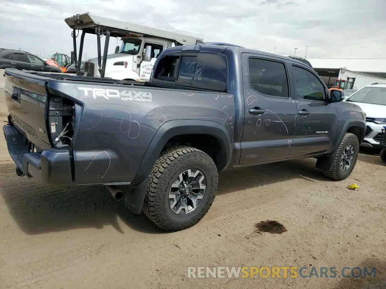3 Photograph of a damaged car 5TFCZ5AN1KX206478 TOYOTA TACOMA 2019