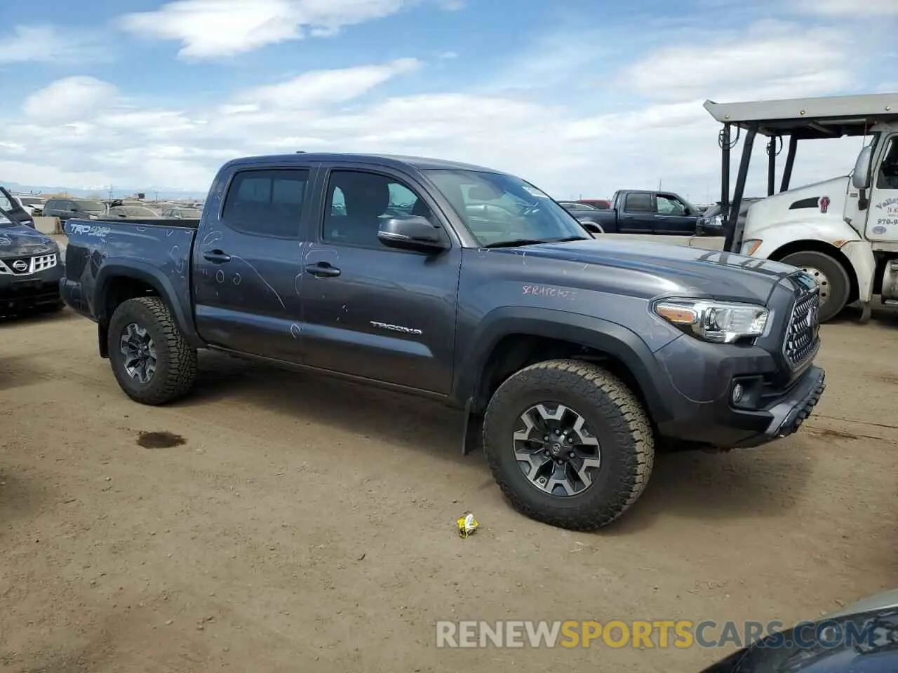 4 Photograph of a damaged car 5TFCZ5AN1KX206478 TOYOTA TACOMA 2019