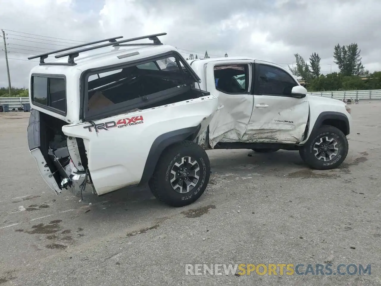 3 Photograph of a damaged car 5TFCZ5AN1KX209607 TOYOTA TACOMA 2019