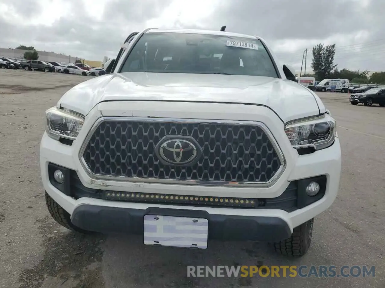5 Photograph of a damaged car 5TFCZ5AN1KX209607 TOYOTA TACOMA 2019