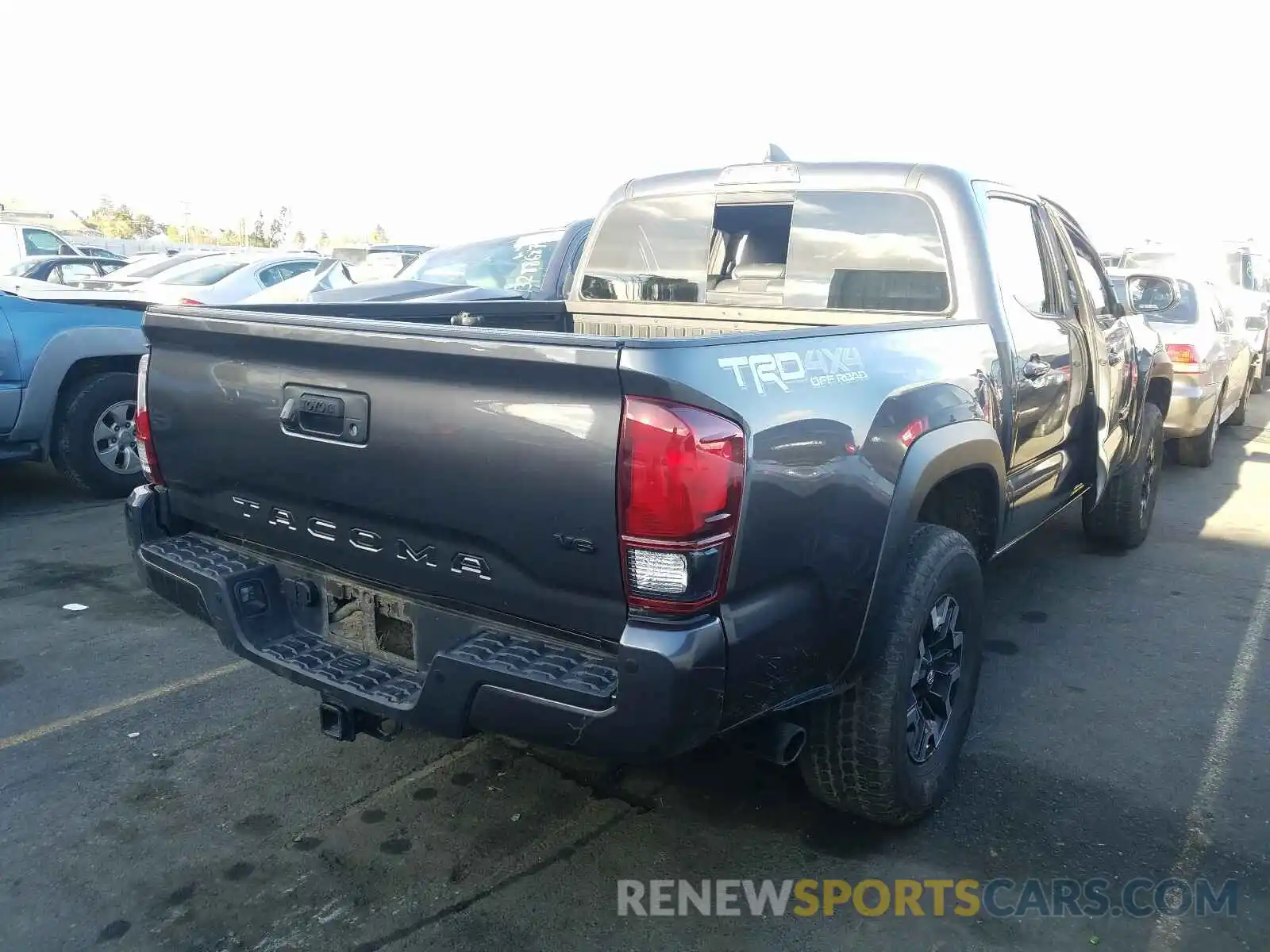 4 Photograph of a damaged car 5TFCZ5AN1KX210403 TOYOTA TACOMA 2019