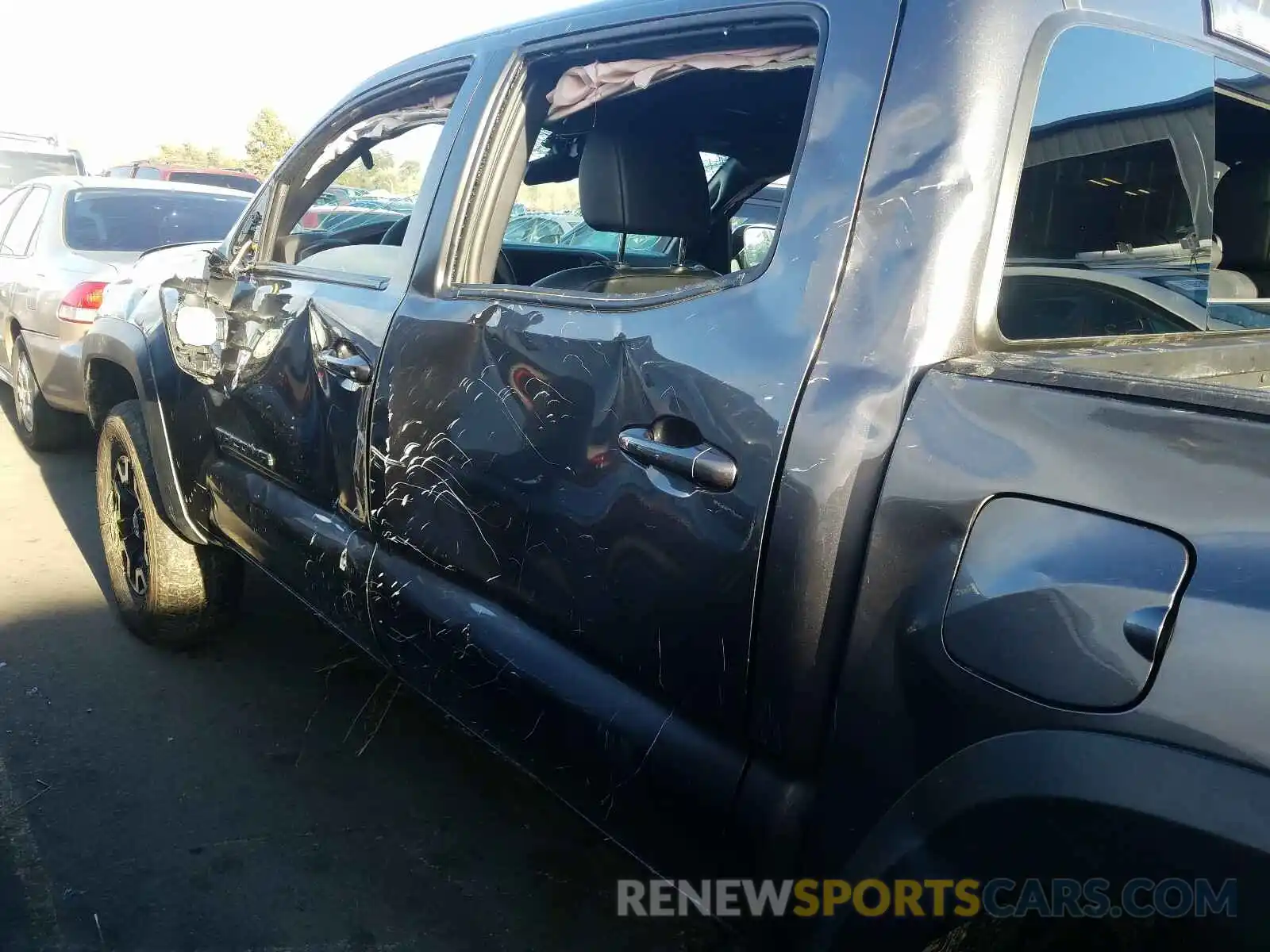 9 Photograph of a damaged car 5TFCZ5AN1KX210403 TOYOTA TACOMA 2019