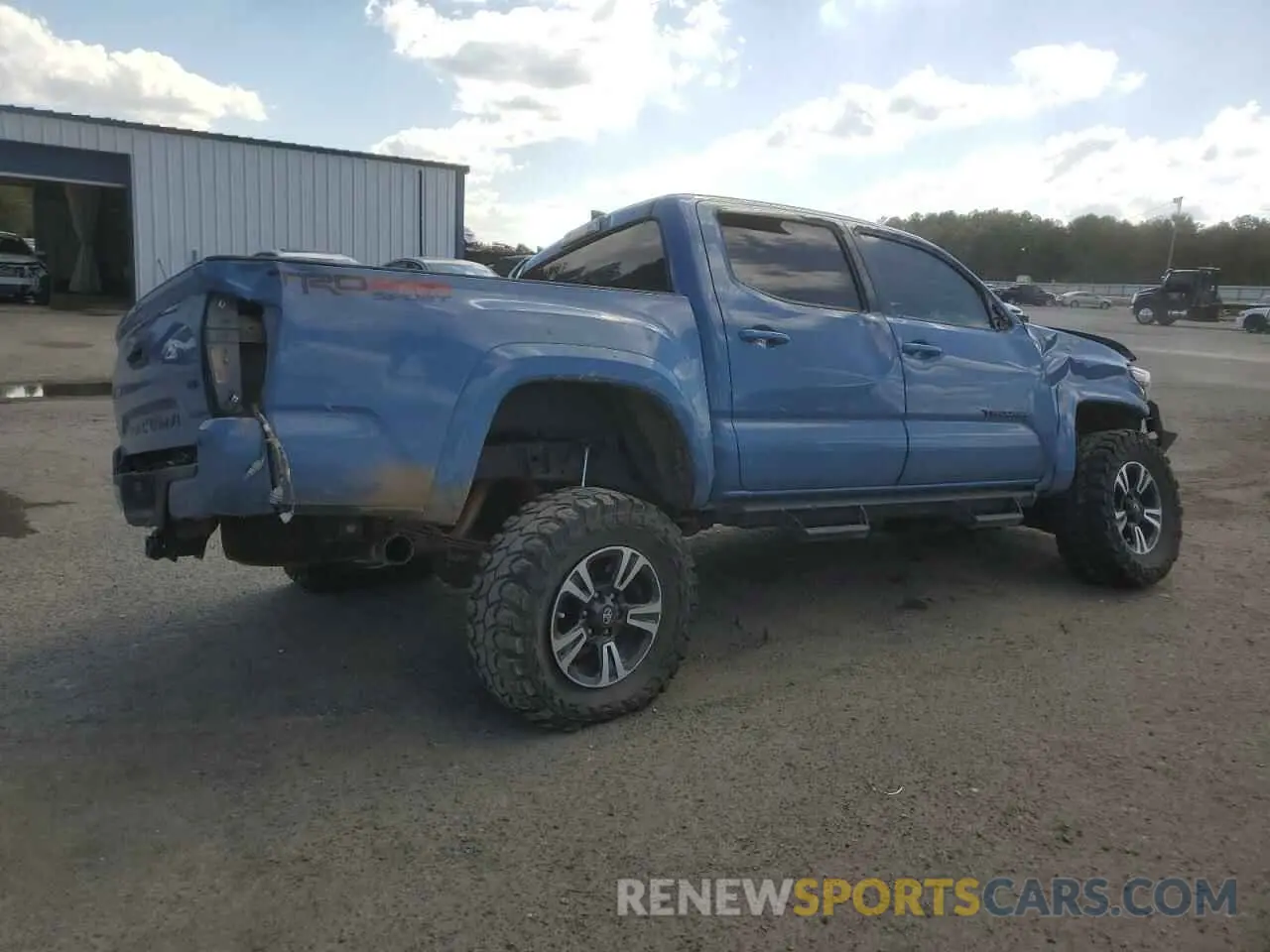 3 Photograph of a damaged car 5TFCZ5AN1KX210451 TOYOTA TACOMA 2019