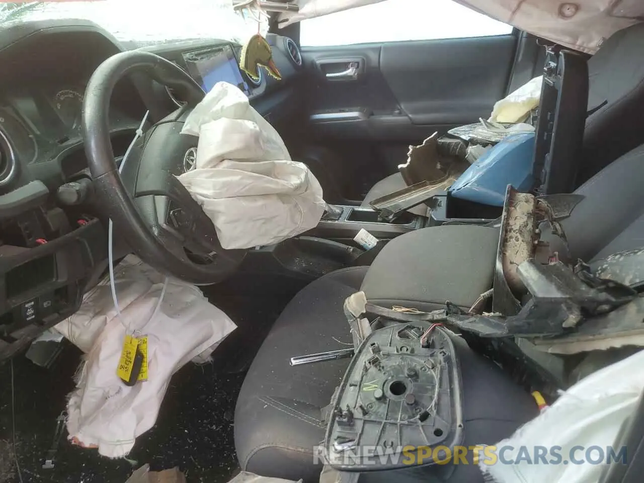 7 Photograph of a damaged car 5TFCZ5AN1KX210451 TOYOTA TACOMA 2019