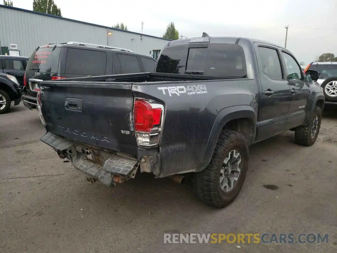 4 Photograph of a damaged car 5TFCZ5AN2KX184054 TOYOTA TACOMA 2019