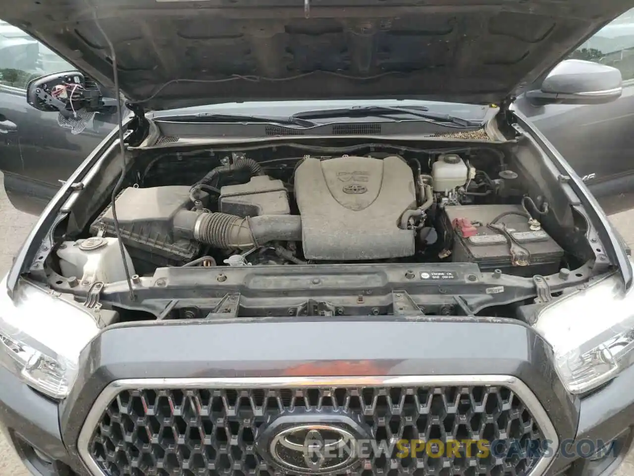 7 Photograph of a damaged car 5TFCZ5AN2KX184054 TOYOTA TACOMA 2019