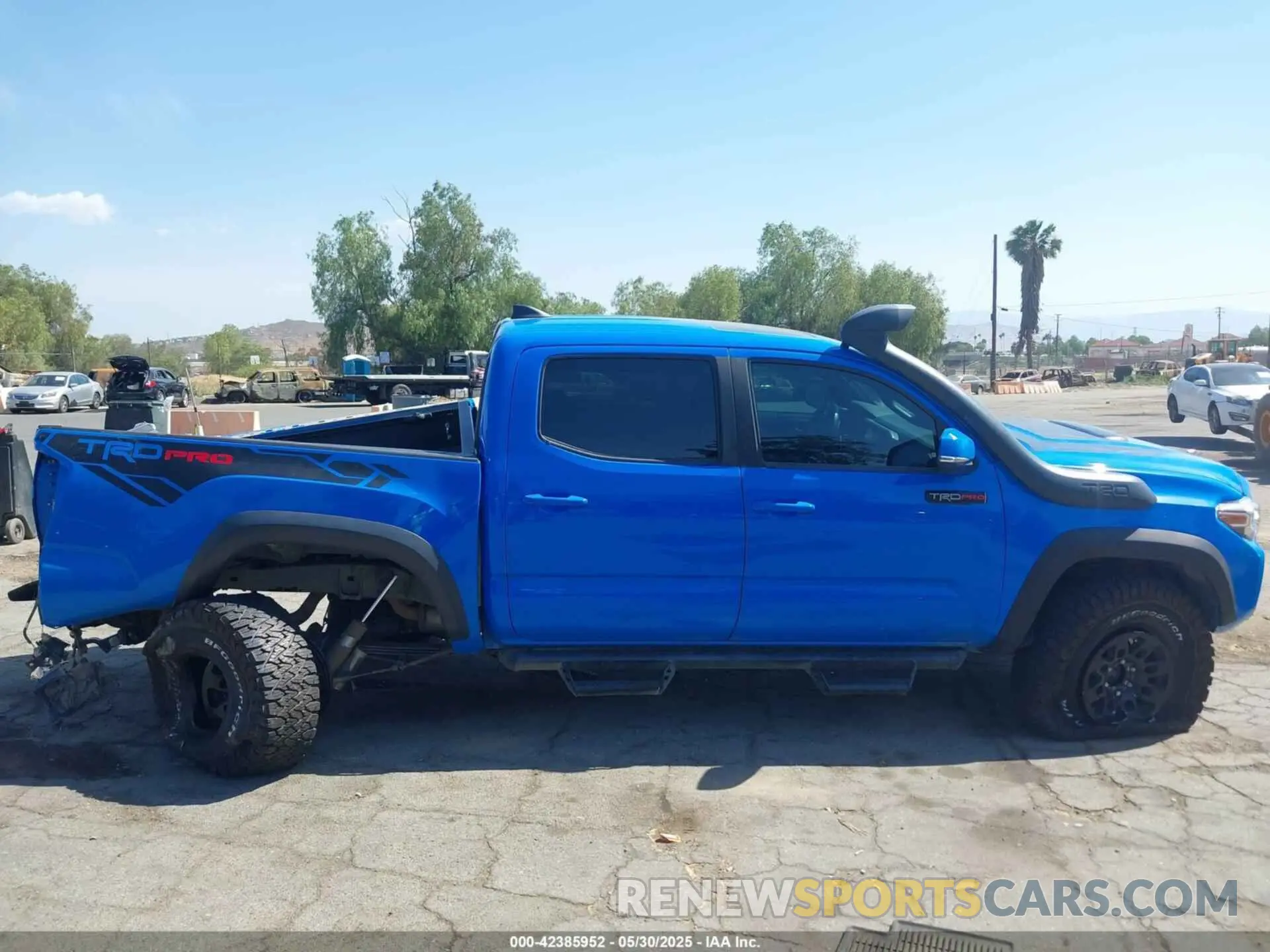 14 Photograph of a damaged car 5TFCZ5AN2KX185186 TOYOTA TACOMA 2019