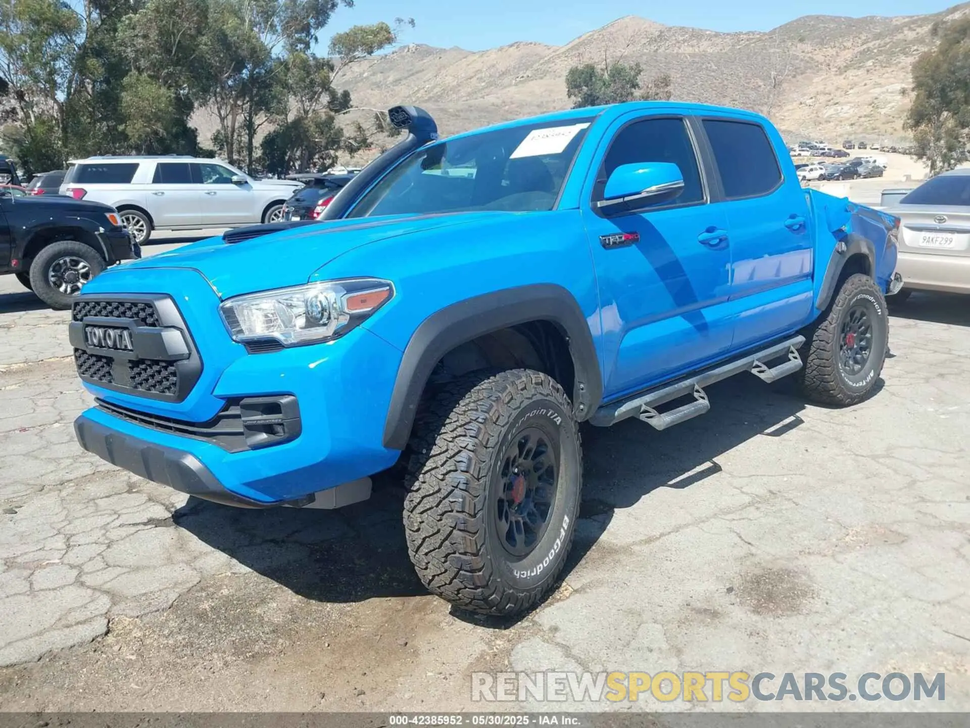 2 Photograph of a damaged car 5TFCZ5AN2KX185186 TOYOTA TACOMA 2019