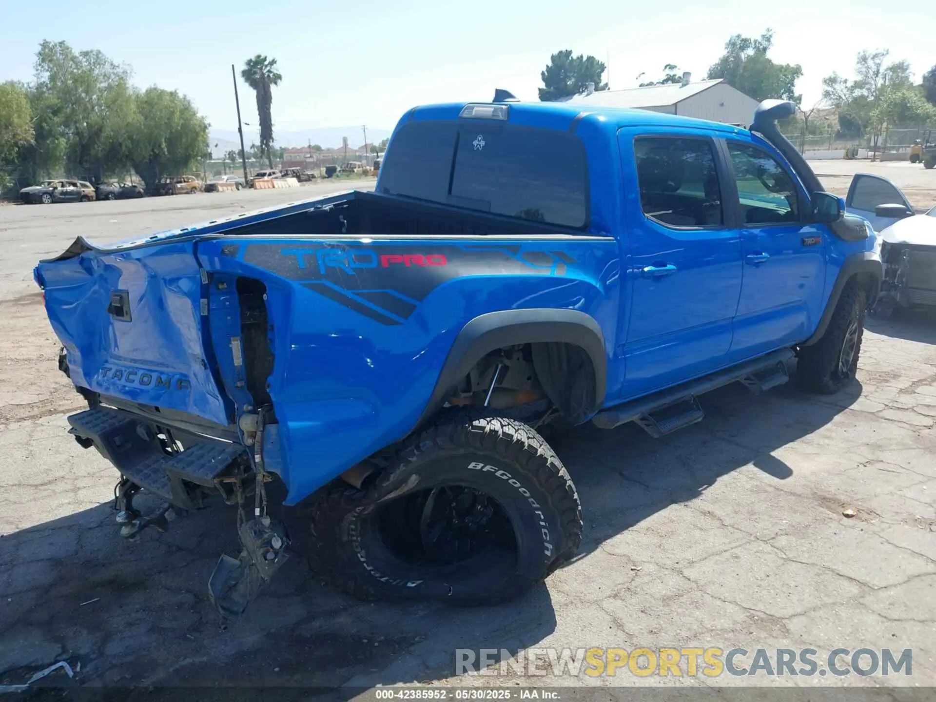 4 Photograph of a damaged car 5TFCZ5AN2KX185186 TOYOTA TACOMA 2019