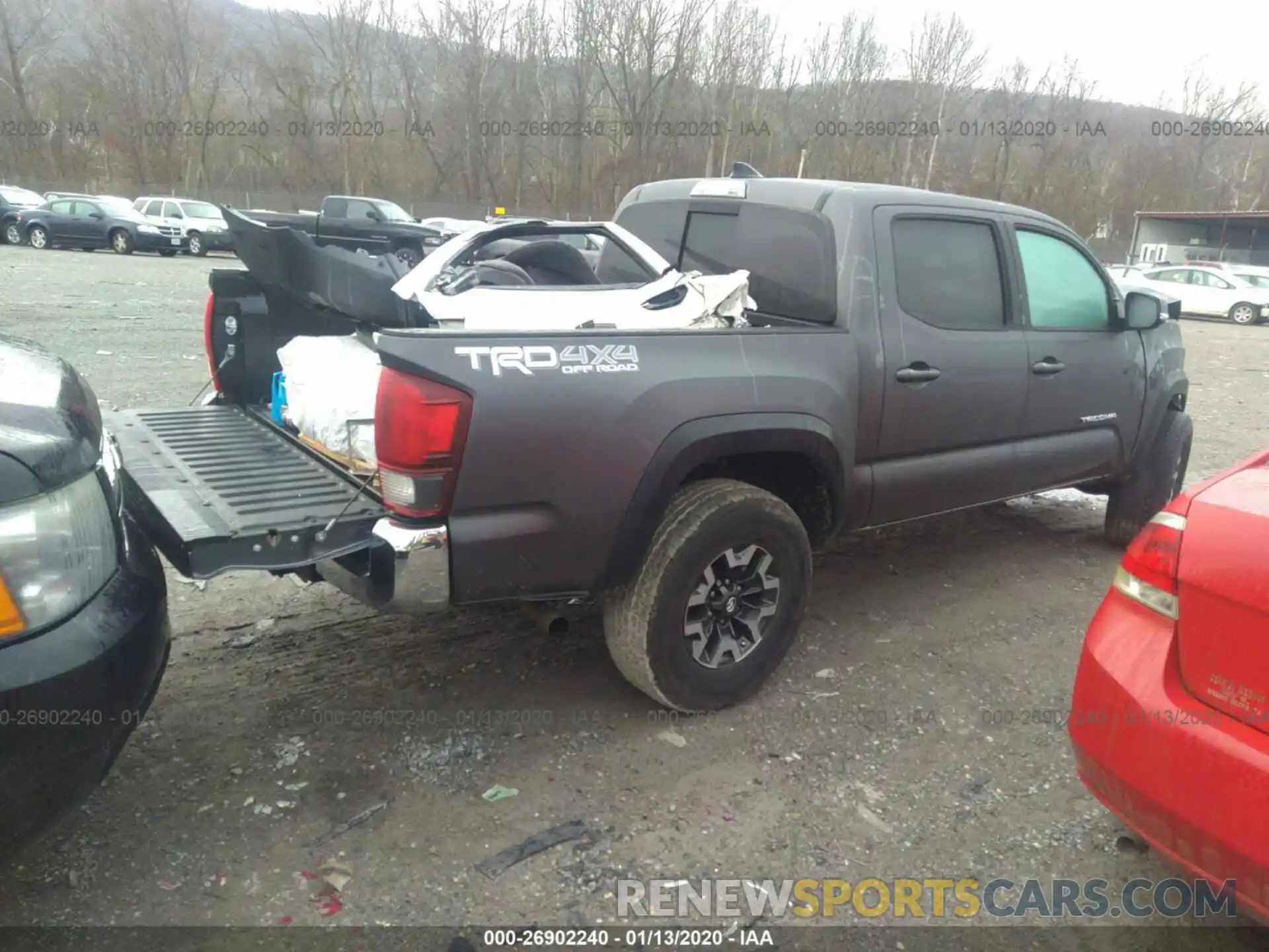 4 Photograph of a damaged car 5TFCZ5AN2KX185611 TOYOTA TACOMA 2019