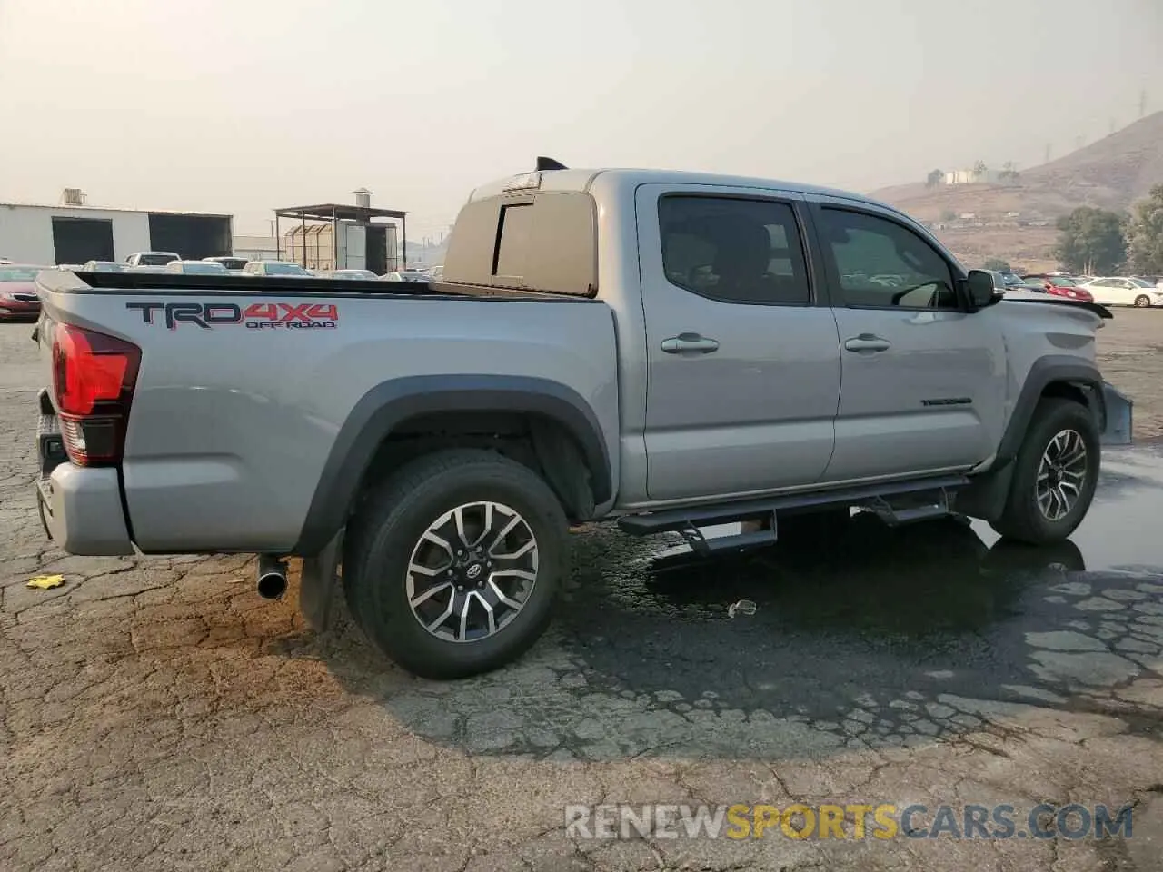 3 Photograph of a damaged car 5TFCZ5AN2KX193921 TOYOTA TACOMA 2019