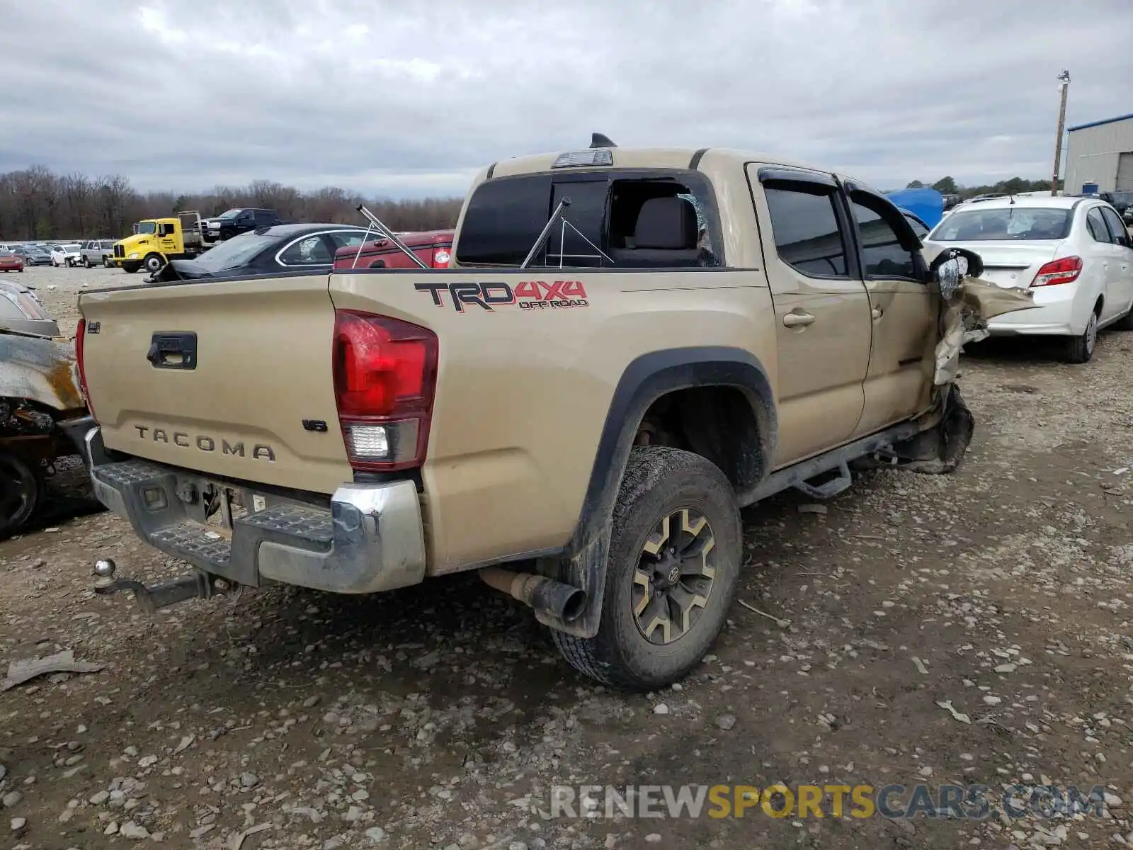 4 Photograph of a damaged car 5TFCZ5AN2KX194499 TOYOTA TACOMA 2019