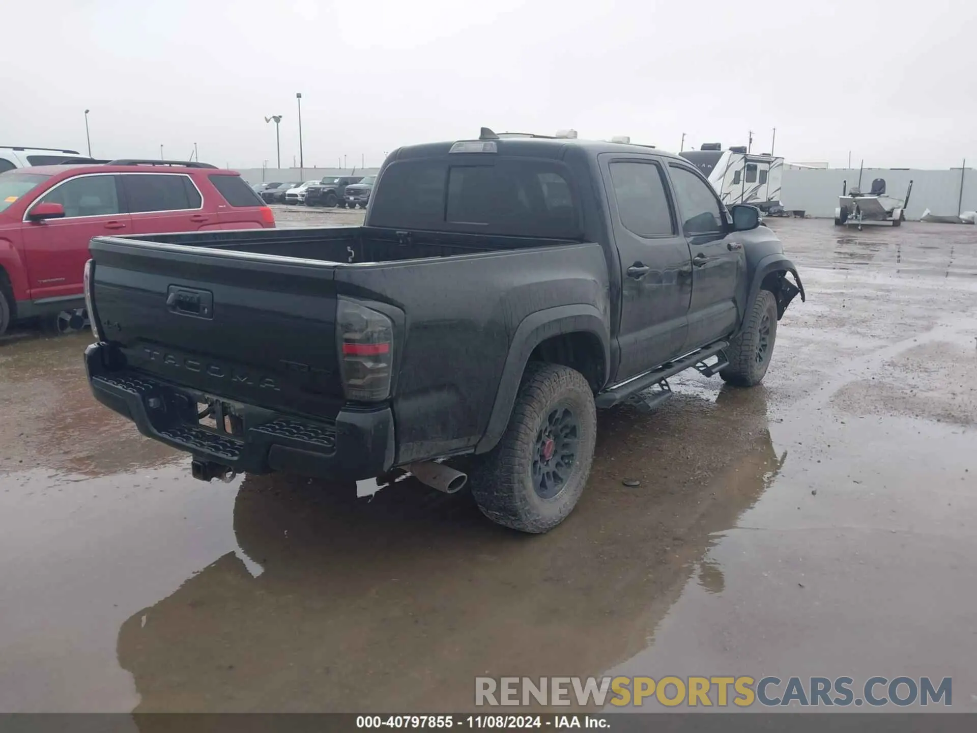 4 Photograph of a damaged car 5TFCZ5AN2KX195085 TOYOTA TACOMA 2019