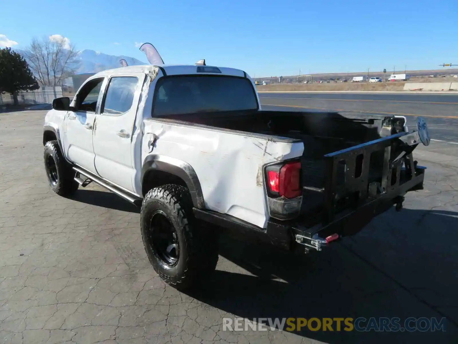 3 Photograph of a damaged car 5TFCZ5AN2KX211026 TOYOTA TACOMA 2019