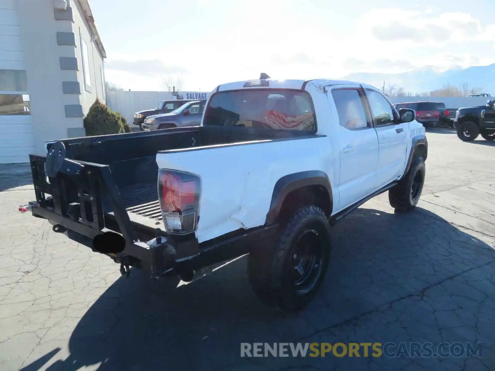 4 Photograph of a damaged car 5TFCZ5AN2KX211026 TOYOTA TACOMA 2019