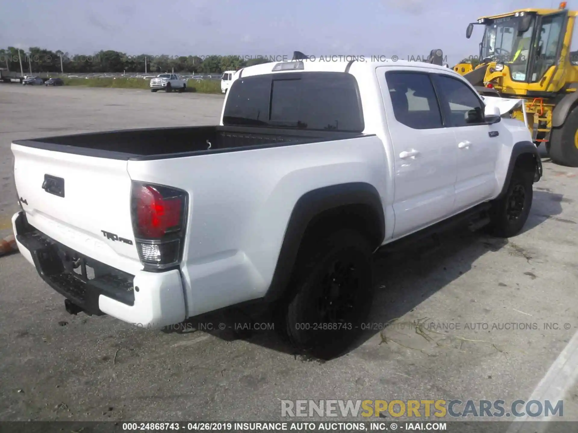 4 Photograph of a damaged car 5TFCZ5AN3KX173791 TOYOTA TACOMA 2019