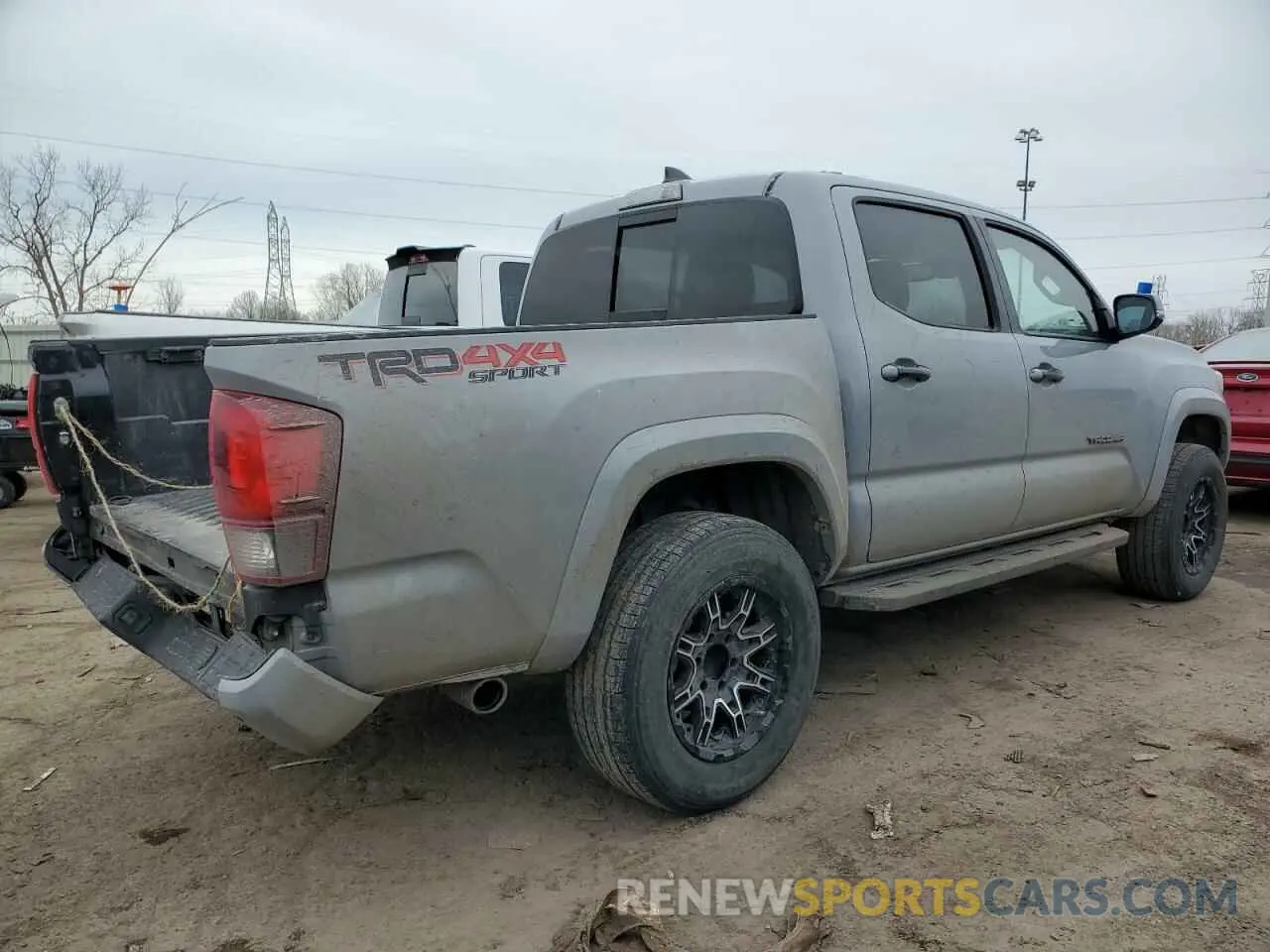 3 Photograph of a damaged car 5TFCZ5AN3KX174701 TOYOTA TACOMA 2019