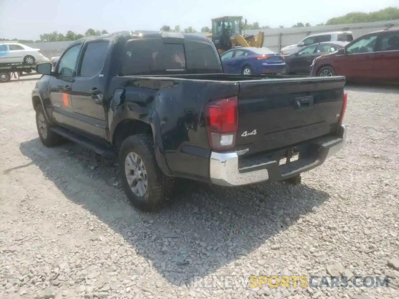 3 Photograph of a damaged car 5TFCZ5AN3KX180191 TOYOTA TACOMA 2019