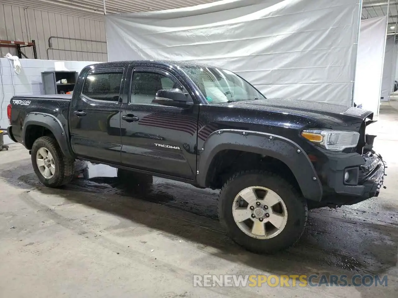 4 Photograph of a damaged car 5TFCZ5AN3KX196150 TOYOTA TACOMA 2019