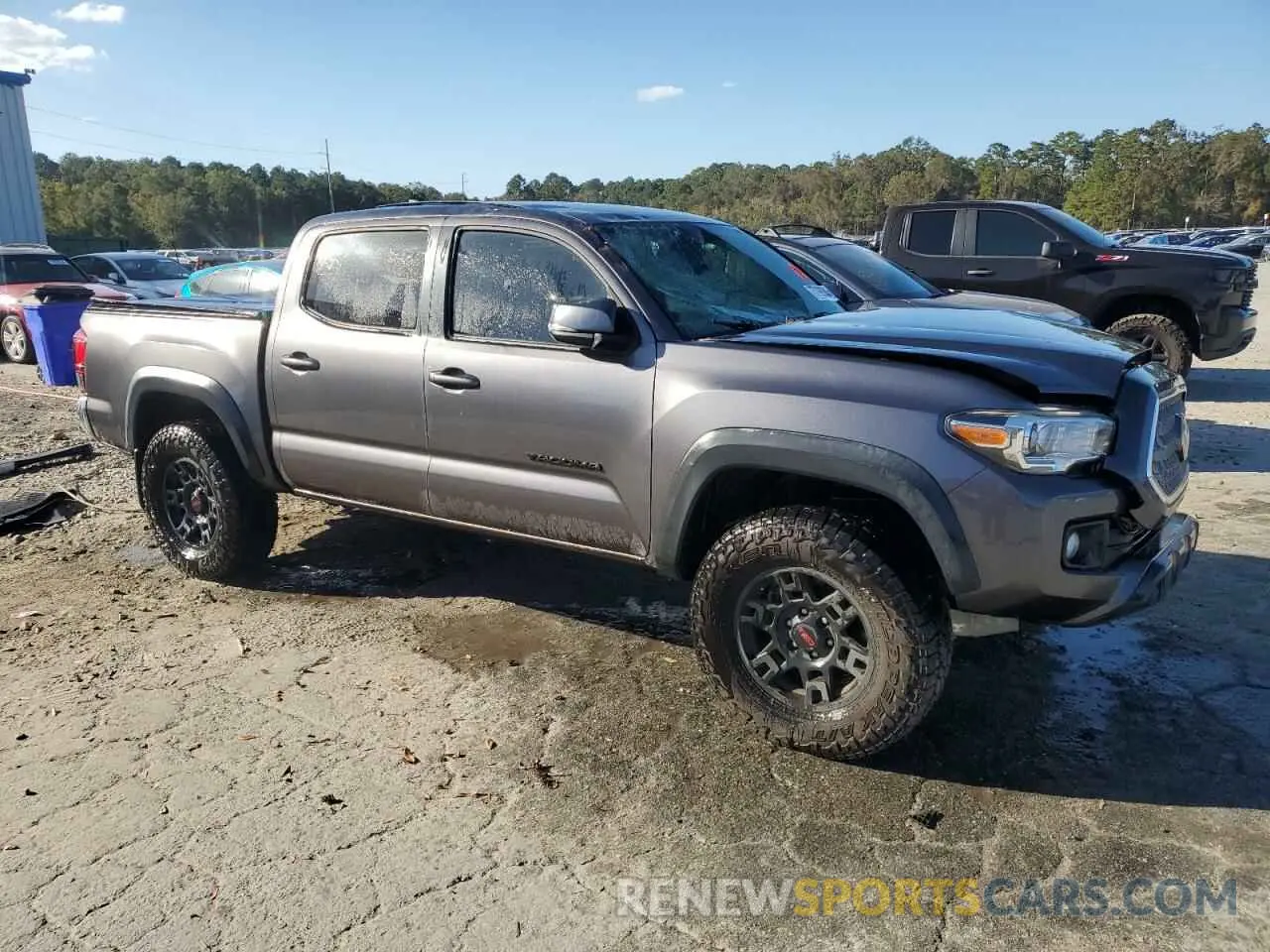 4 Photograph of a damaged car 5TFCZ5AN3KX196259 TOYOTA TACOMA 2019