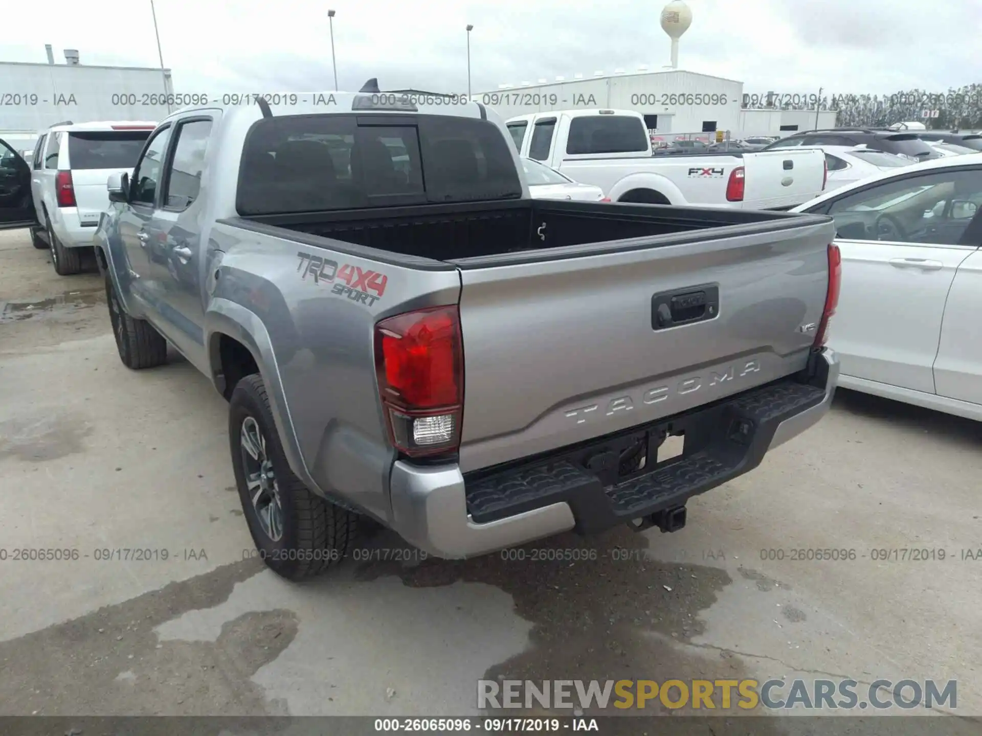 3 Photograph of a damaged car 5TFCZ5AN3KX203226 TOYOTA TACOMA 2019