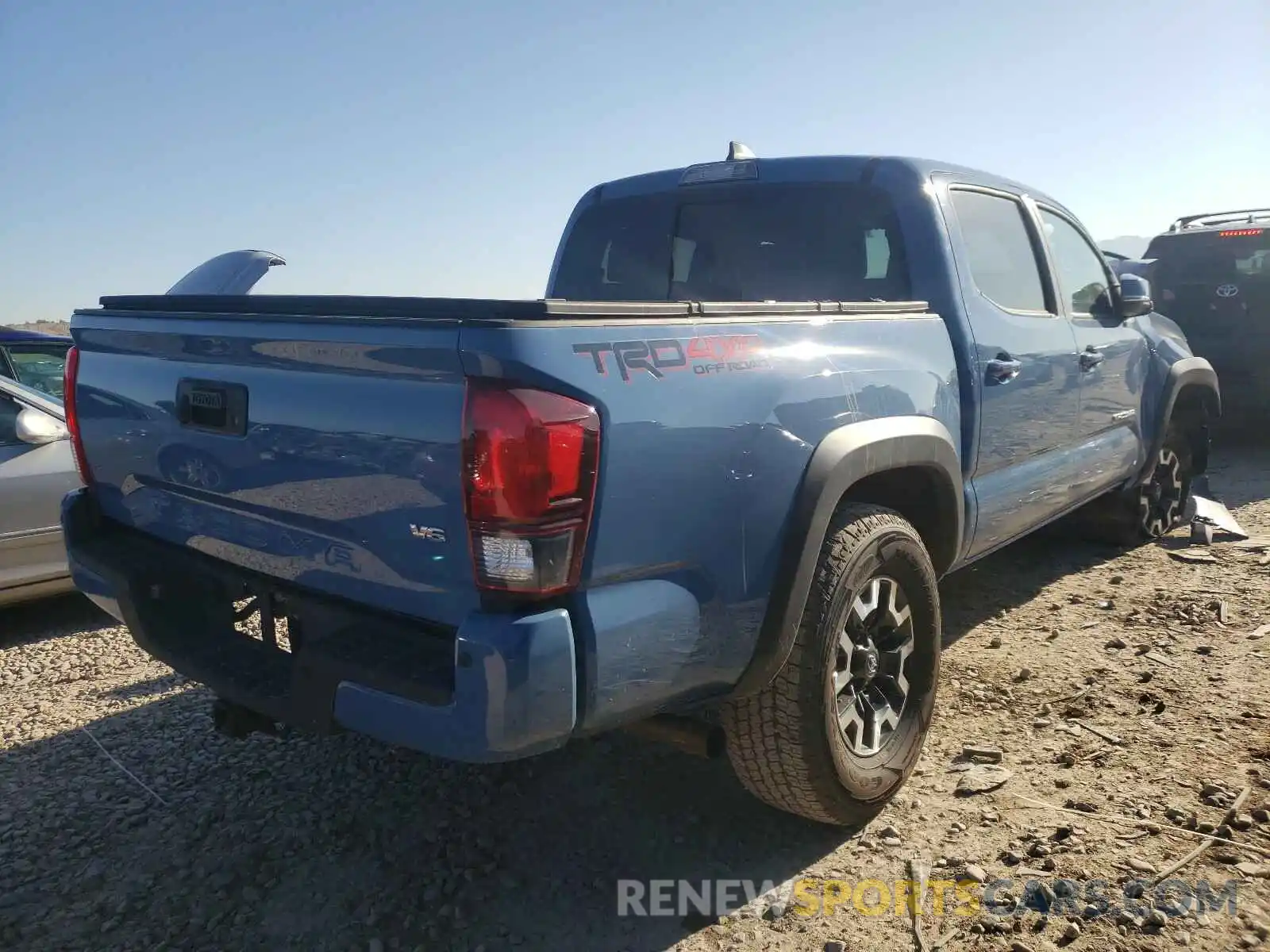 4 Photograph of a damaged car 5TFCZ5AN3KX212279 TOYOTA TACOMA 2019