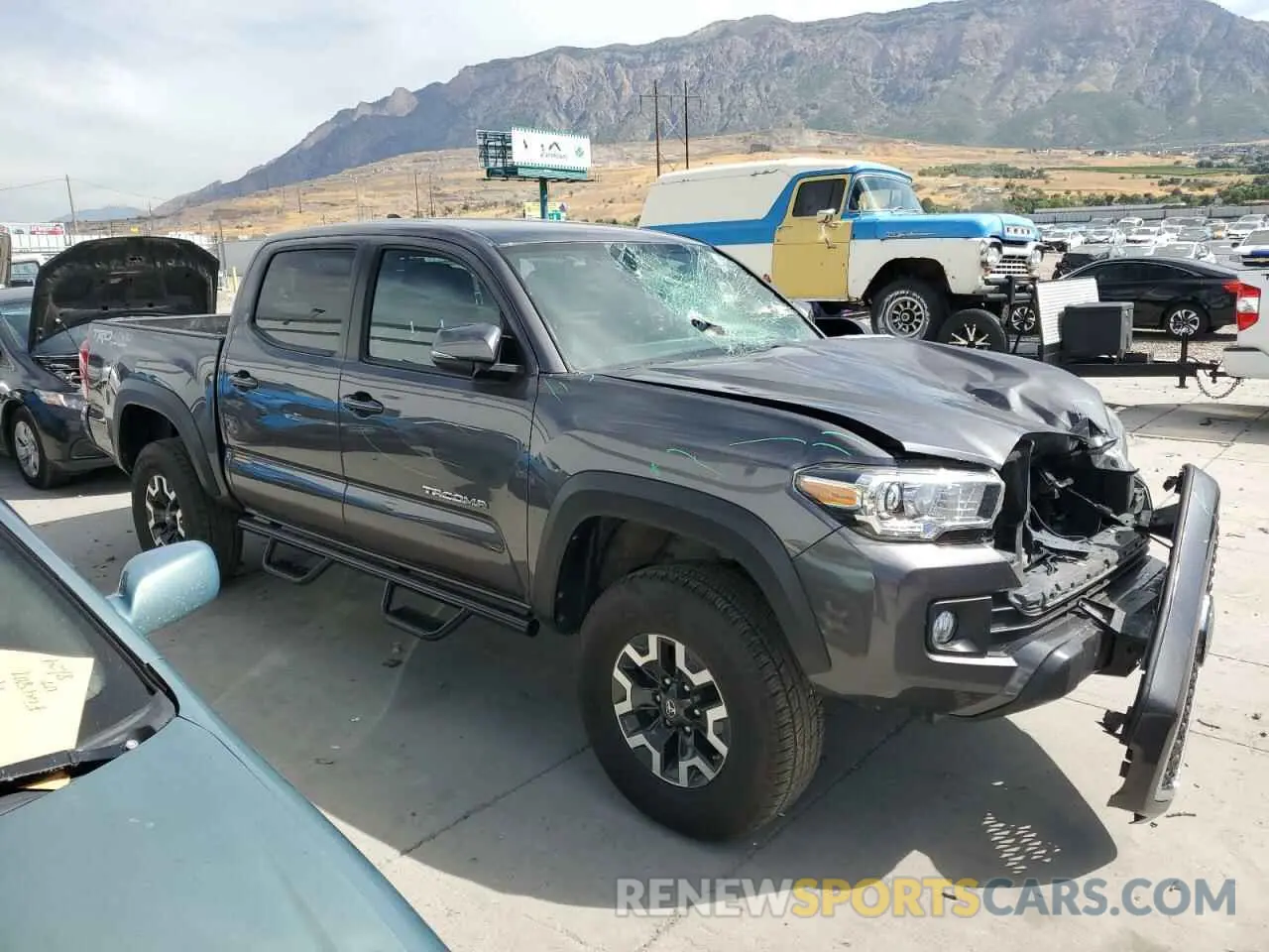 4 Photograph of a damaged car 5TFCZ5AN4KX180801 TOYOTA TACOMA 2019