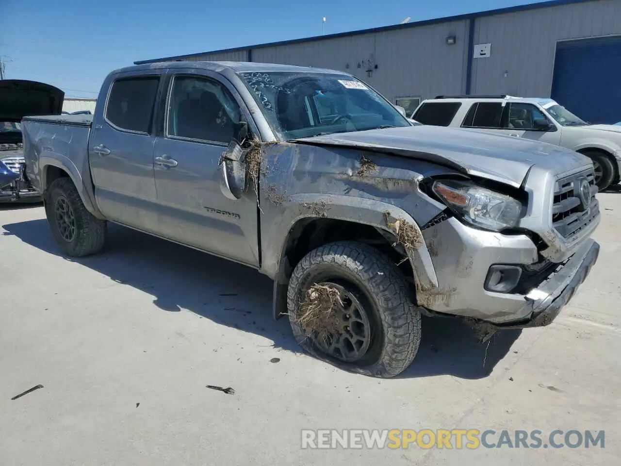 4 Photograph of a damaged car 5TFCZ5AN4KX199736 TOYOTA TACOMA 2019