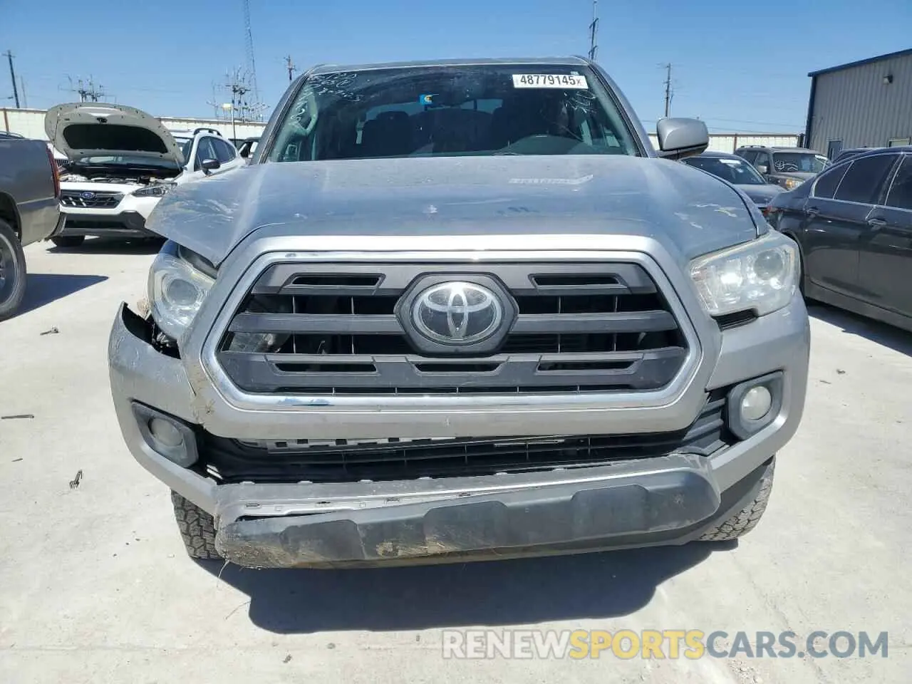 5 Photograph of a damaged car 5TFCZ5AN4KX199736 TOYOTA TACOMA 2019